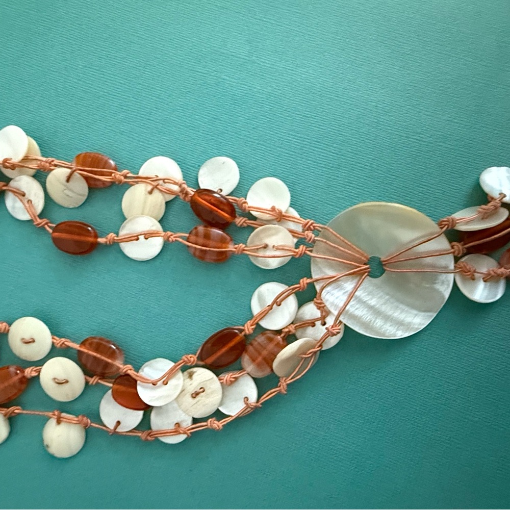 Elegant Shell Necklace with Brown and Cream Accents